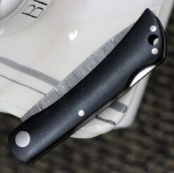 Boker Solingen Rangebuster 110914DAM, 3.03" Stainless Steel Damascus Blade, Black Linen Micarta Handles 7 Boker Solingen Rangebuster 110914DAM, 3.03" Stainless Steel Damascus Blade, Black Linen Micarta Handles -OTF Knives Shop BO110914DAM.2 69193.1646840109